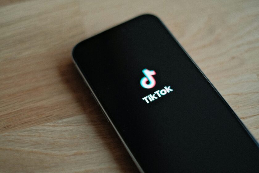 TikTok app interface on smartphone screen for brand marketing